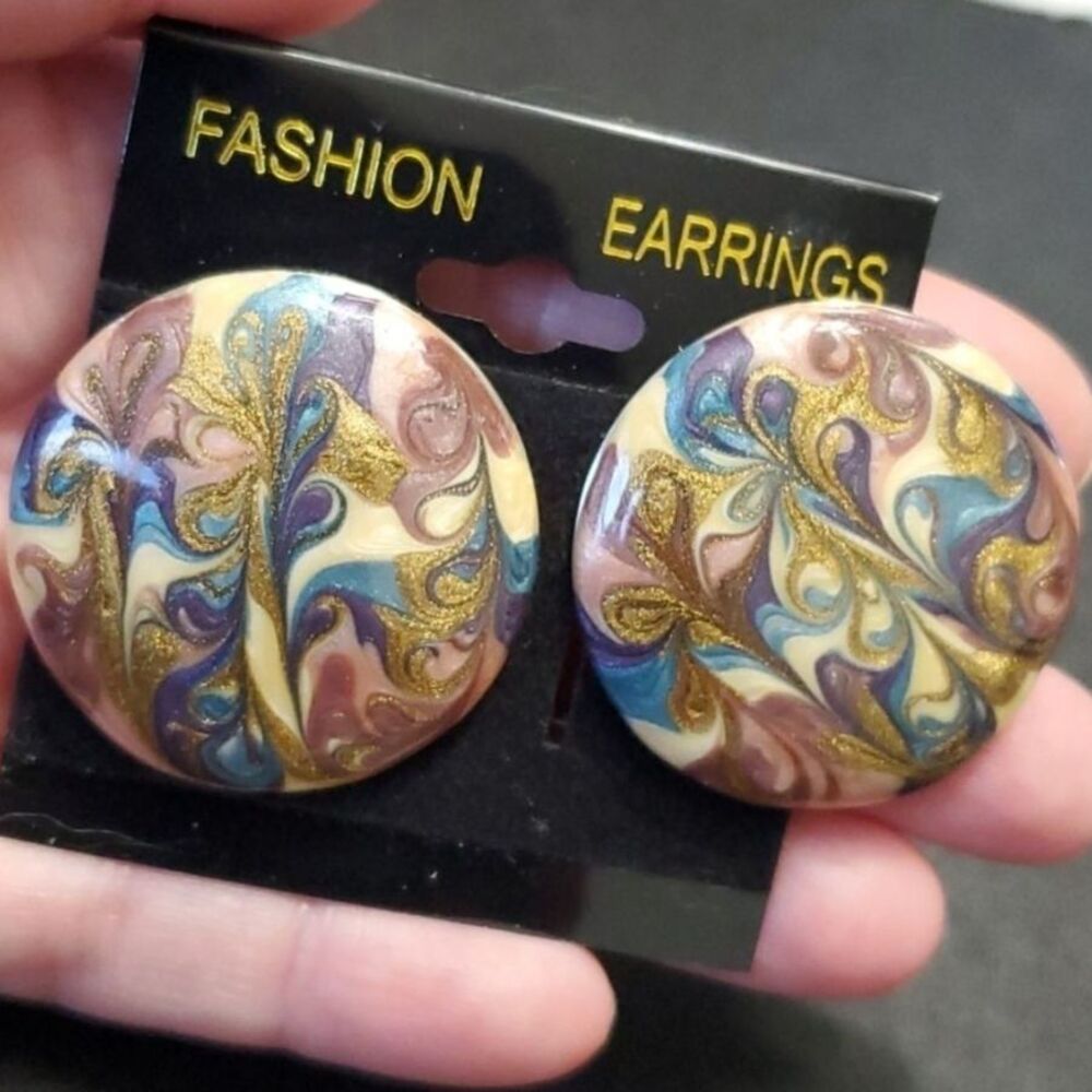 Shimmery swirly circular fashion earrings